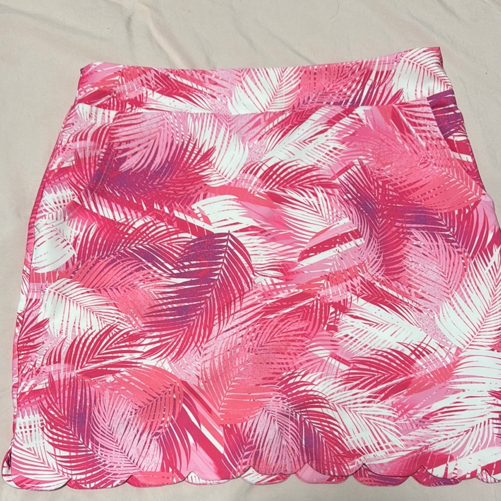 Pink and White golf skirt with liner and side zipper never worn new w/o tag MED